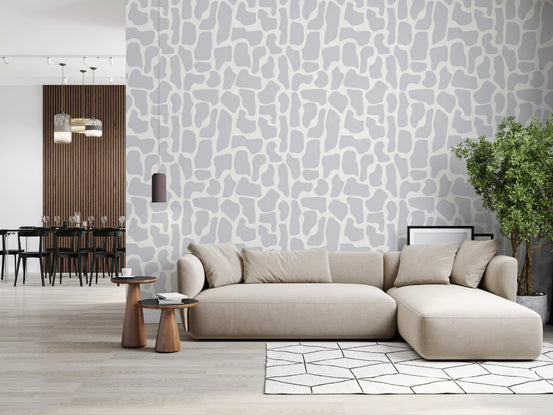 Stone mosaic wallpaper with soft grey shapes on a creamy ground in living room GD11604
