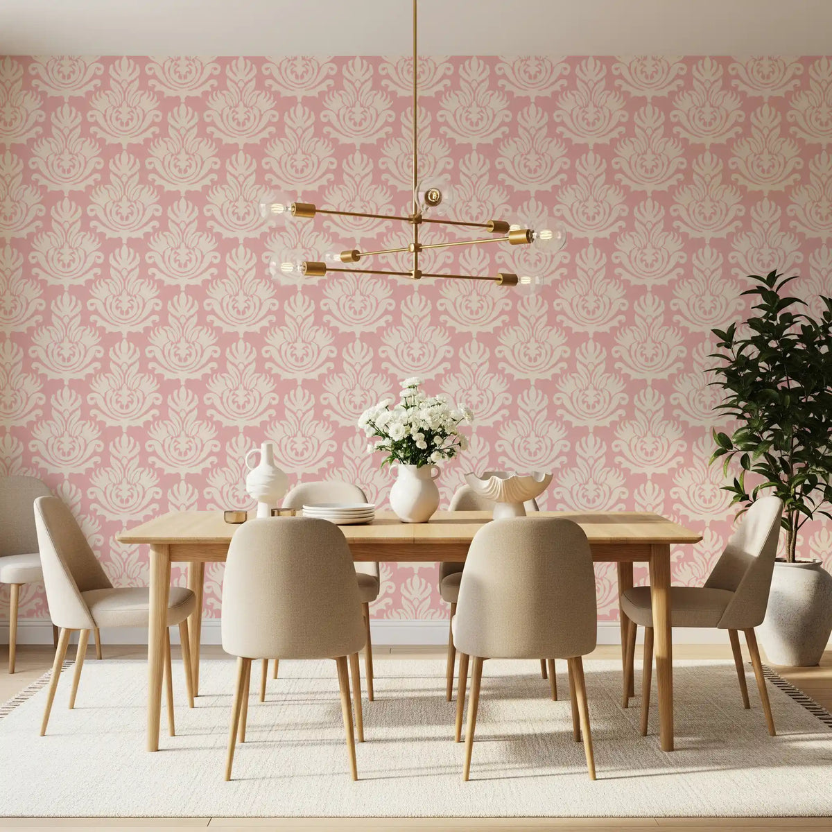 Pink damask wallpaper in a dining room with a wood table and a brass chandelier GD11938