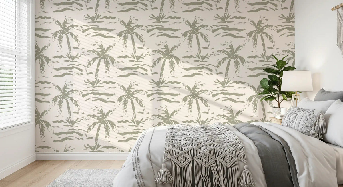 Sage green palm tropical wallpaper in a soft bedroom with grey bedding GD11993