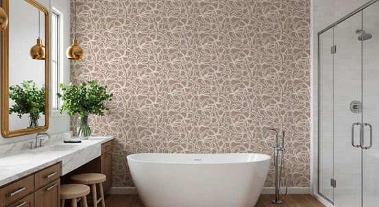 Taupe and cream abstract botanical wallpaper in a bright bathroom with a freestanding tub GD12013