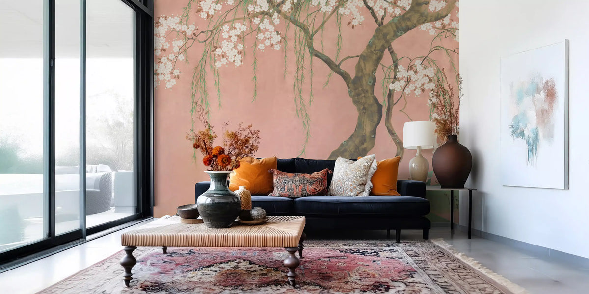 Blossoming cherry willow sakura tree mural on a coral pink sky shown in a living room GD12159