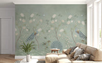 Sage garden peacock mural in a cosy living room with a cream sofa and plants GD12210