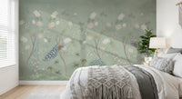 Sage blossom mural behind a bed in a calm bedroom with knit bedding GD12210