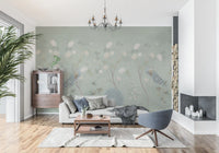 Green peacock mural in a living room with a grey sofa near a fireplace GD12210