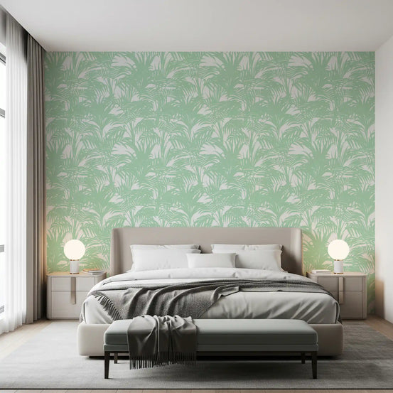 Sage green palm leaf pattern wallpaper in a calm bedroom with a low bed GD12211