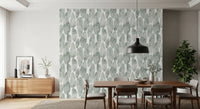Sage pebbled wallpaper in a dining room with wood sideboard GD12219