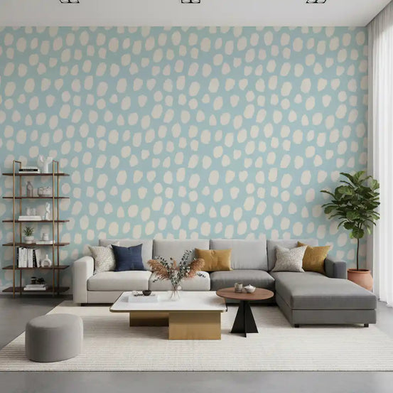 Blue dotted texture abstract wallpaper in a bright living room with a grey sofa and shelves GD12222