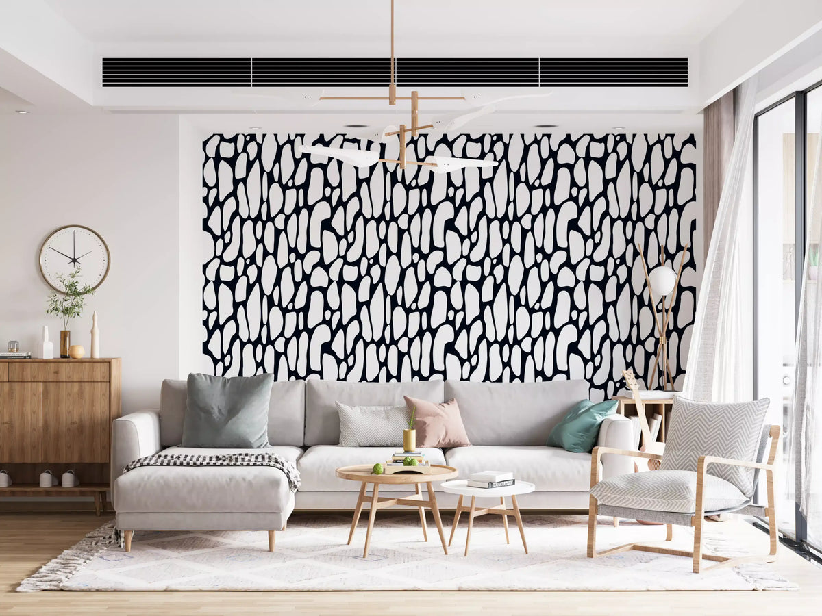Bold black and white pebble mosaic wallpaper on a decorated feature wall GD12223
