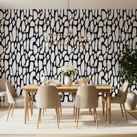 Black and white pebble wallpaper in a dining room with wood table and chairs GD12223