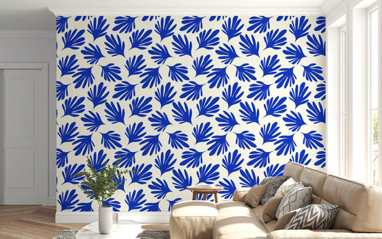 Cobalt blue leaf botanical wallpaper in a living room with a beige sofa GD12225