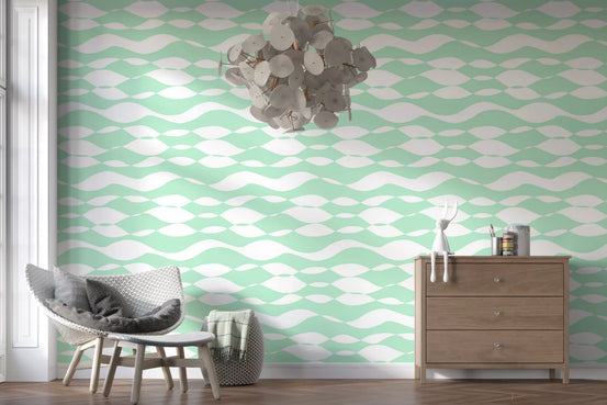 Sage green wavy wallpaper in a cosy reading corner with grey chair GD12233