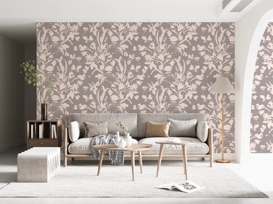 Botanical meadow wallpaper on a living room feature wall with a neutral sofa GD12254