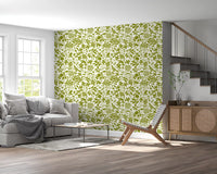 Sage botanical wallpaper in a living room near a staircase with a grey sofa GD12255