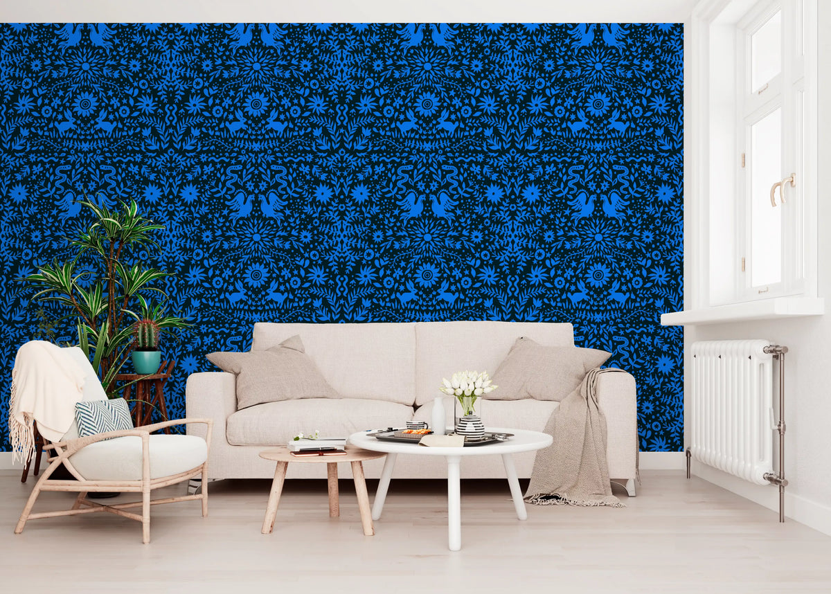 Cobalt blue folk-art floral wallpaper in a bright living room GD12263