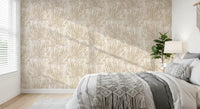 Beige fern wallpaper in a sunlit bedroom with macrame throw GD12266