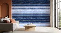 Navy brushstroke stripe wallpaper in a cosy living den GD12267