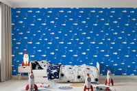 White fish on blue wallpaper in a boy's room with rockets GD12268