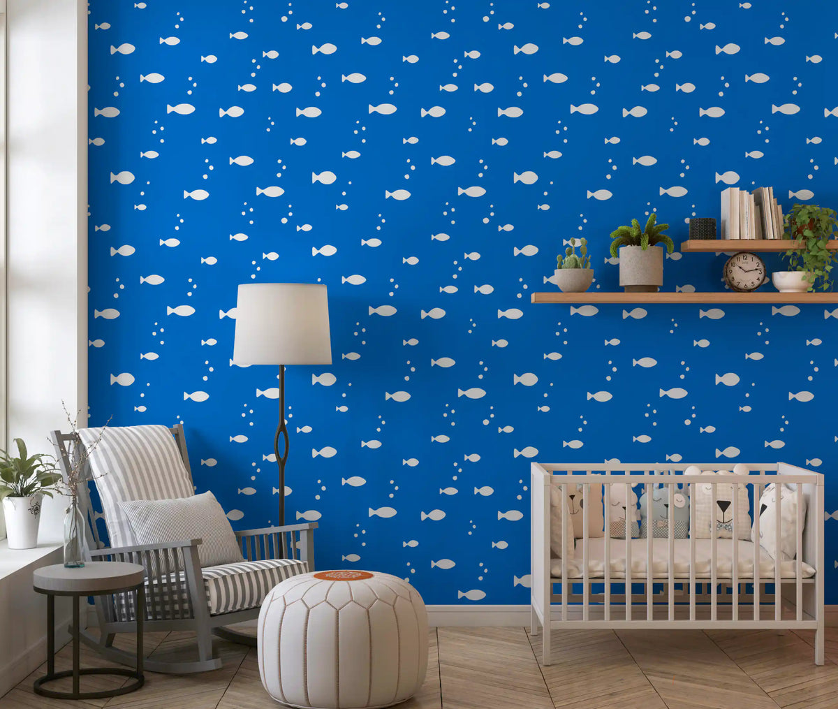 Blue aquatic fish wallpaper in a nursery with a crib GD12268