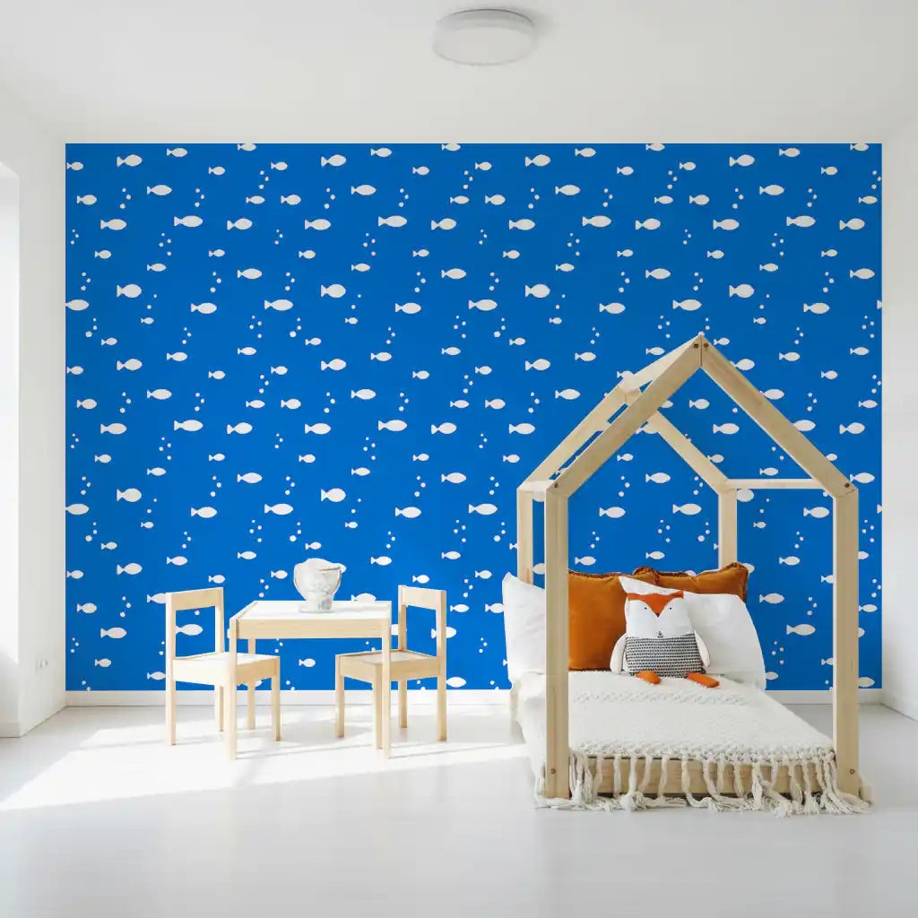 Blue fish wallpaper in a kids' room with a house bed GD12268