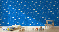 White fish on blue wallpaper in a child's play area GD12268