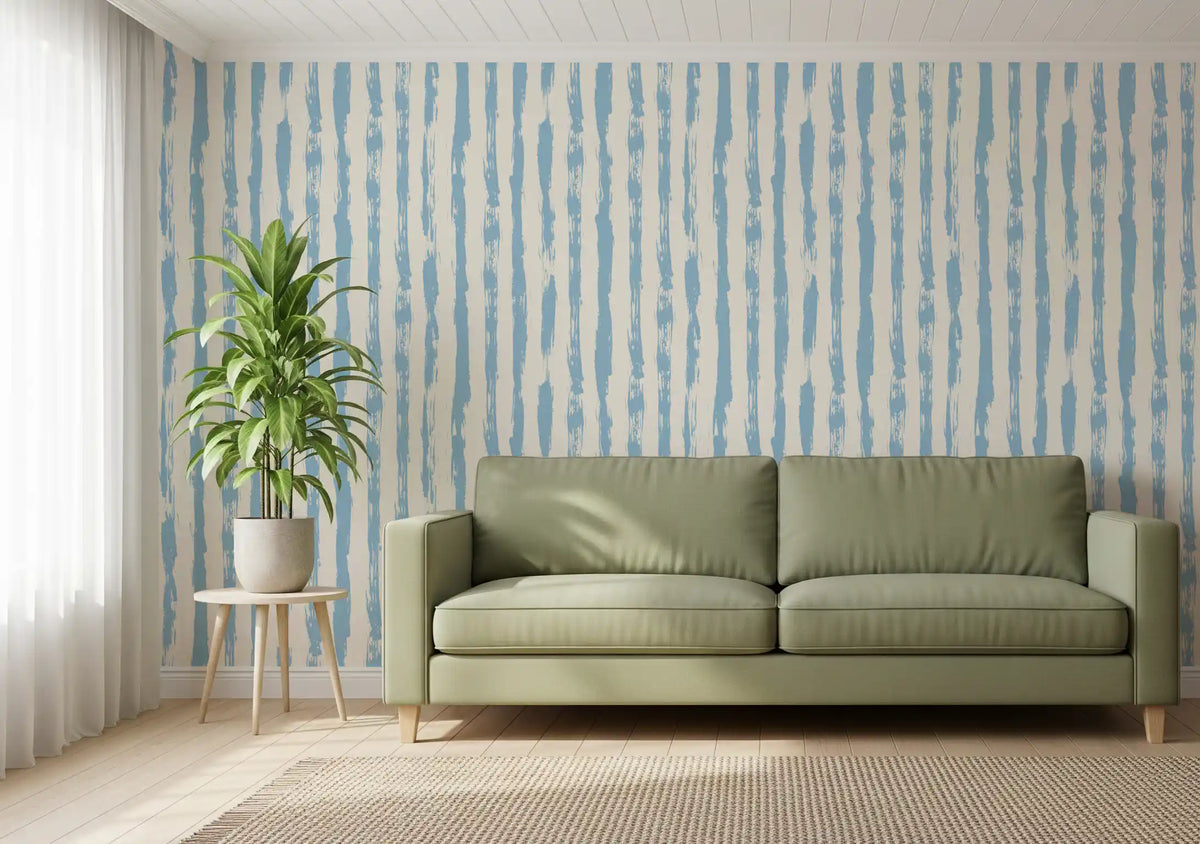 Azure stripe wallpaper behind a green sofa in a living room GD12270