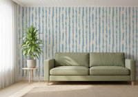 Azure stripe wallpaper behind a green sofa in a living room GD12270
