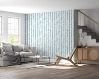 Blue striped wallpaper in a light living room with grey sofa GD12270