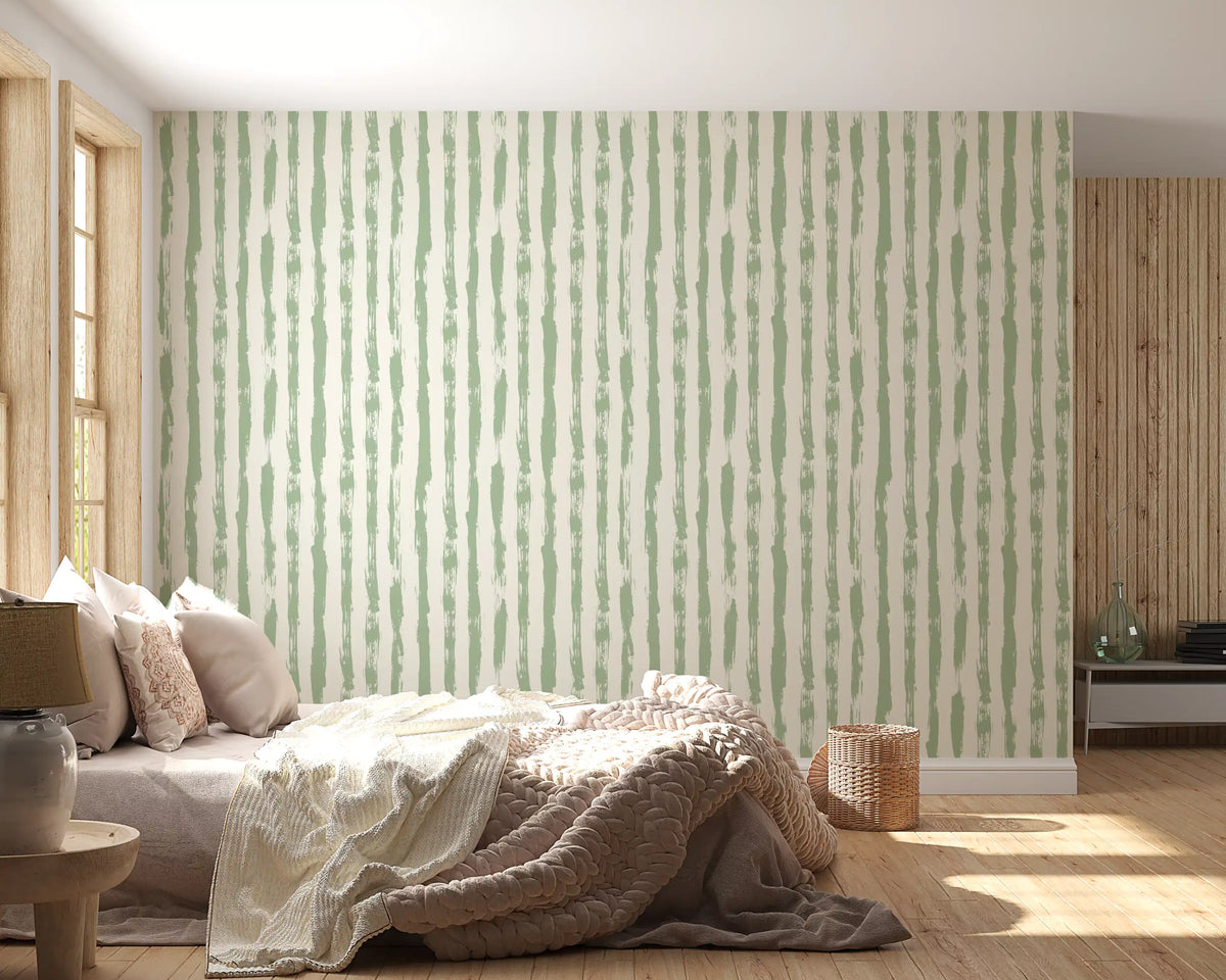 Sage green brushstroke striped wallpaper in a warm bedroom GD12271