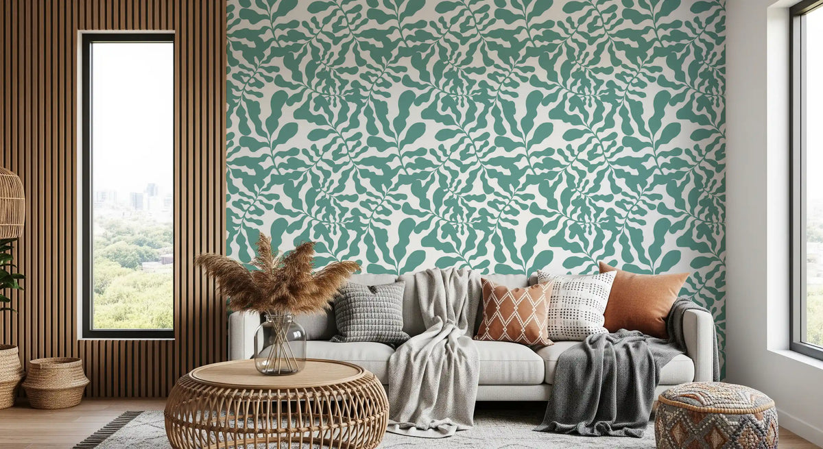 Sage green leaf wallpaper in a cosy living room GD12272