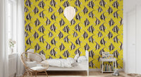 Yellow fish wallpaper behind a bed GD12276