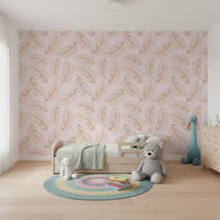 Golden palm leaf wallpaper in a soft nursery GD12278