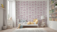 Pink butterfly wallpaper in a nursery with a small bed and shelves GD12294