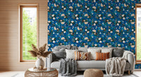 Indigo floral wallpaper in a living room with a grey sofa and window GD12295