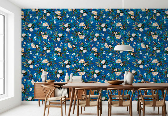 Indigo floral wallpaper in a dining room with a wooden table and pendant light GD12295