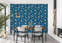 Indigo floral wallpaper in a dining room with white chairs and a wooden table GD12295