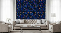 Midnight blue abstract wallpaper in a living room with a grey tufted sofa GD12299