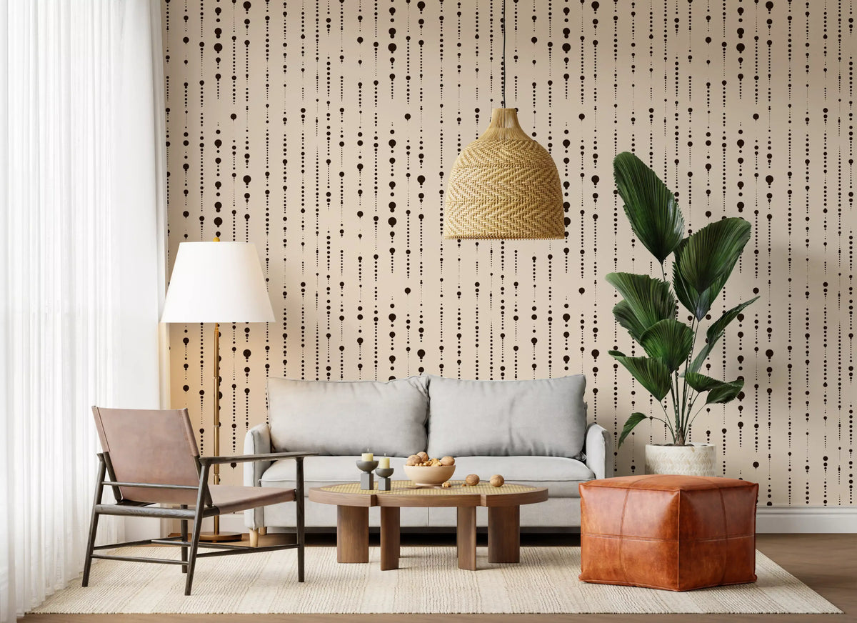 Abstract dot wallpaper in a living room with a rattan pendant and leather pouf GD12303