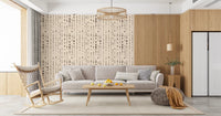 Beige and black dot wallpaper in an open living room beside a wood kitchen GD12303