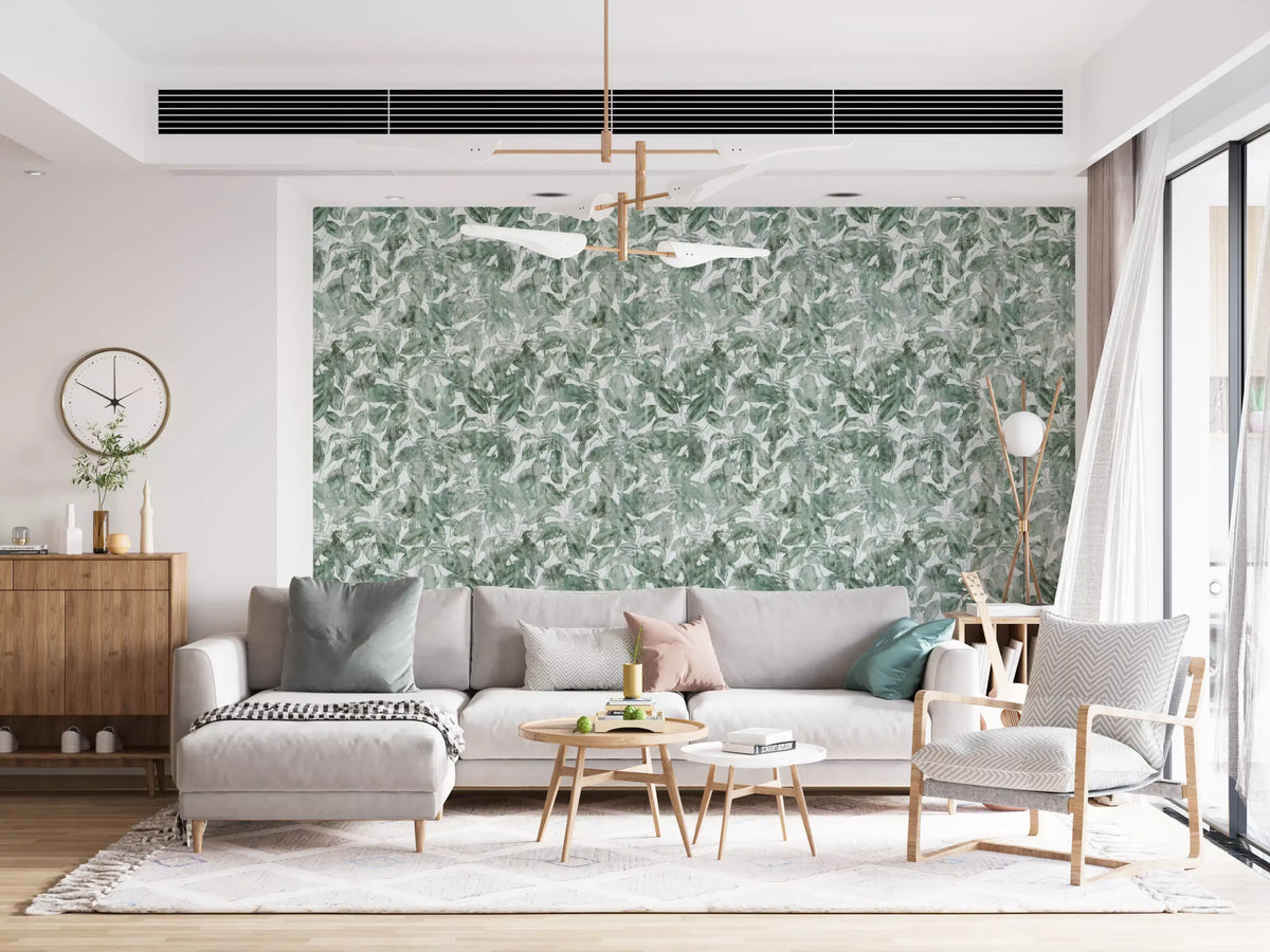 Watercolour forest leaf wallpaper in a living room with a grey sofa GD12325