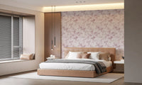 Soft pink floral wallpaper behind a bed in a calm modern bedroom GD12352