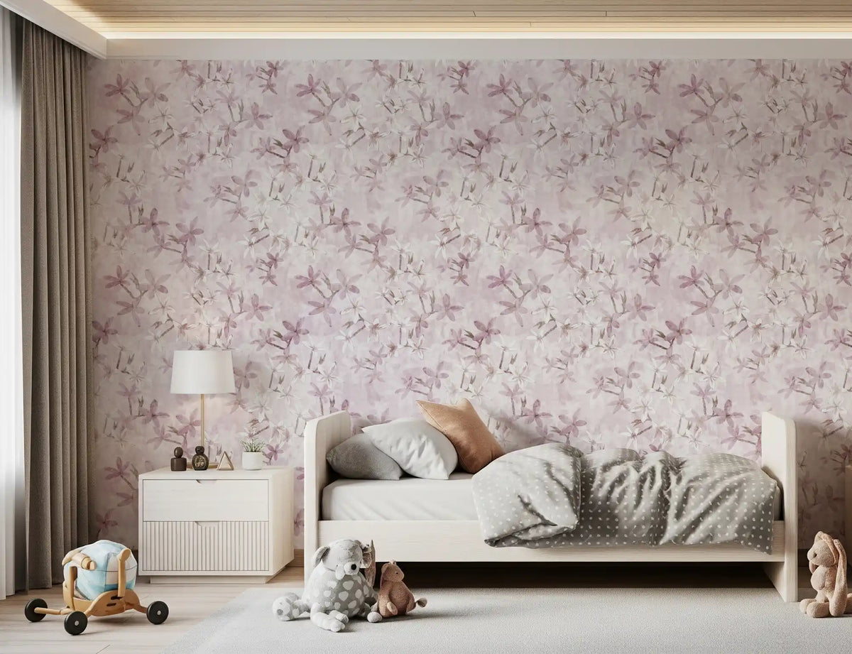 Blush floral wallpaper in a child's bedroom with a daybed and soft toys GD12352