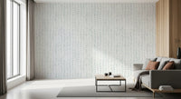 Soft botanical wallpaper in a bright living room with a grey sofa GD12359