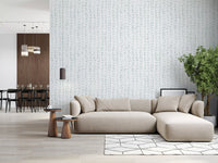 Soft botanical wallpaper in an open living and dining space GD12359