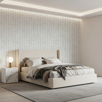 Leaf vine wallpaper behind a bed in a calm modern bedroom GD12359