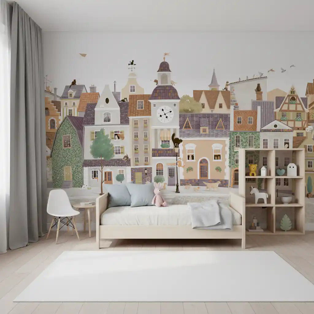 Pastel town mural behind a white toddler bed in a soft nursery GD12398
