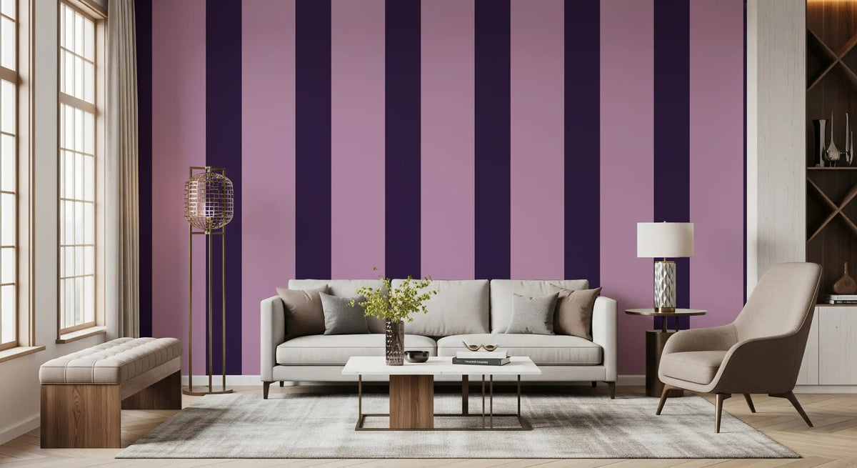 Lilac and plum stripe wallpaper behind a grey sofa in a living room GD12446