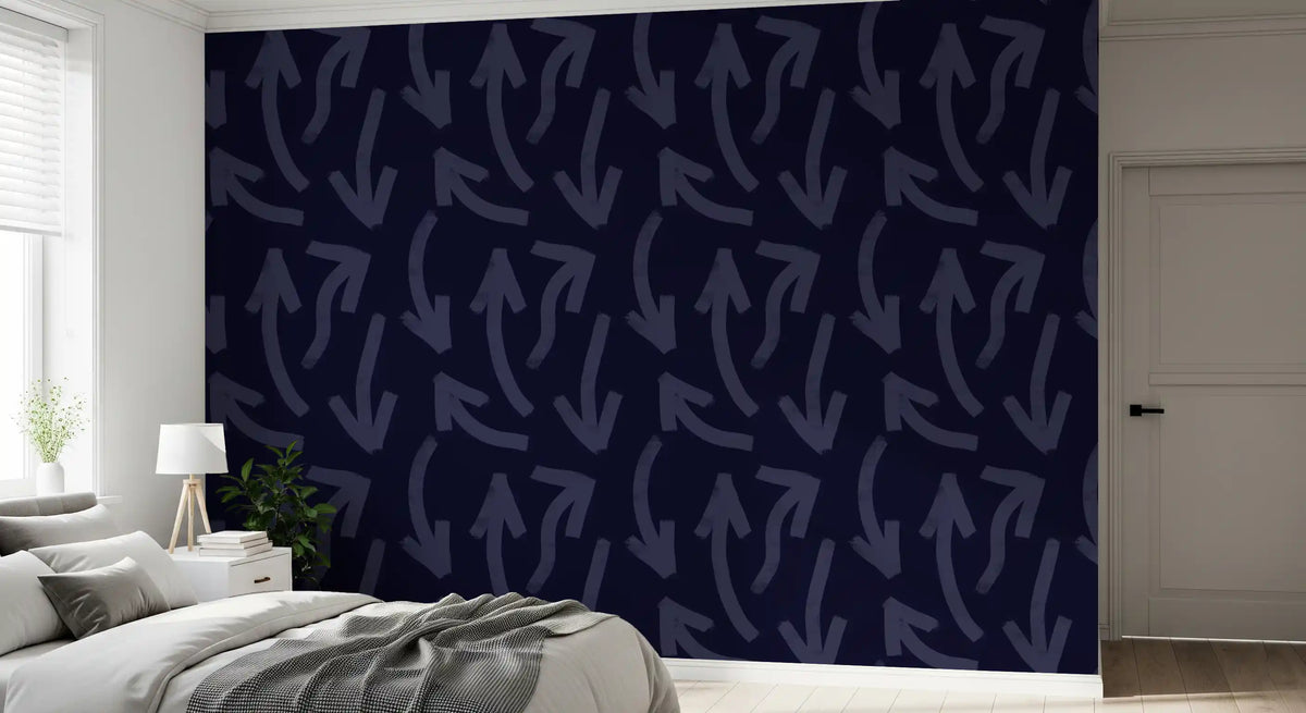 Navy directional stroke wallpaper behind a bed in a calm bedroom GD12469