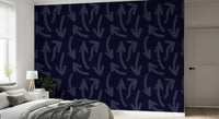 Navy directional stroke wallpaper behind a bed in a calm bedroom GD12469
