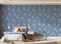 Muted blue arrow wallpaper in a childs bedroom with soft toys GD12470
