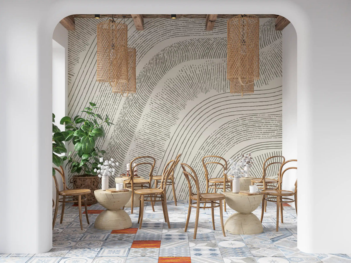 Etched-line beige mural in a dining nook with cane chairs and plants GD12473